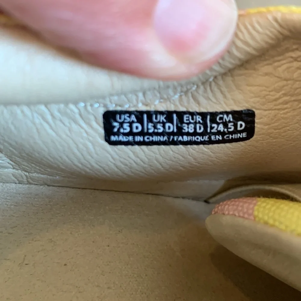 Spenco size 7.5 yellow and pink slip on sneakers